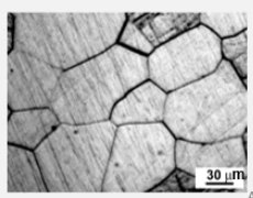 Acid etched surface of a polycrystalline metal